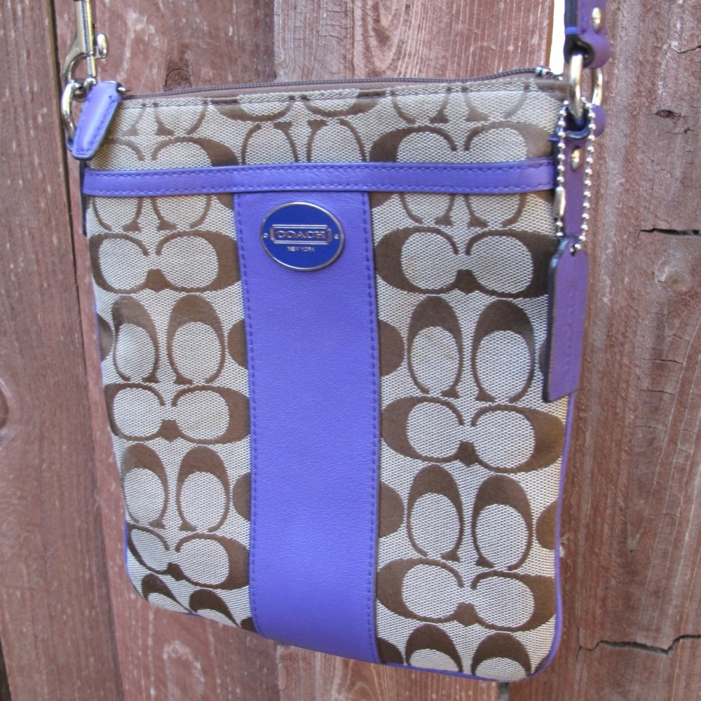 Coach adjustable crossbody purse with purple accents